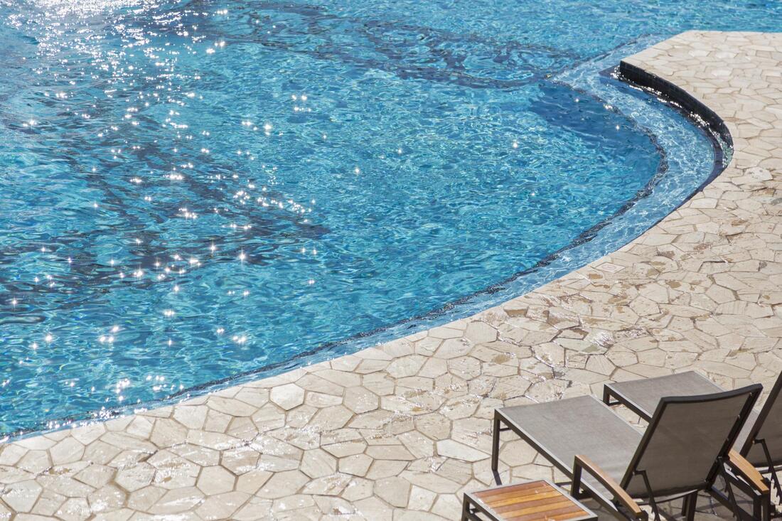 decorative and stamped concrete pool deck